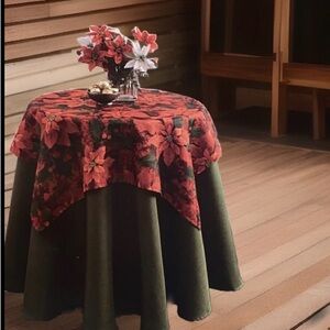 Christmas Poinsettia Fabric Tablecloth and Topper Robert Stanley 70 in. Round